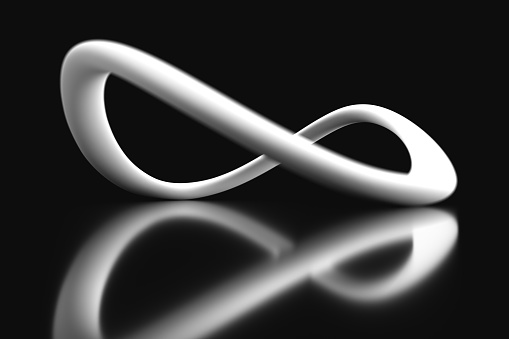 Digitally generated image of the infinity sign on a black background