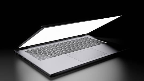 istock 8K 3D rendered isolated Half Opened Laptop with Blank Screen Display on the floor in the Dark room with one light source Version 1 1226618337