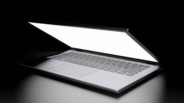 istock 8K 3D rendered isolated Half Opened Laptop with Blank Screen Display on the floor in the Dark room with one light source Version 2 1226618343