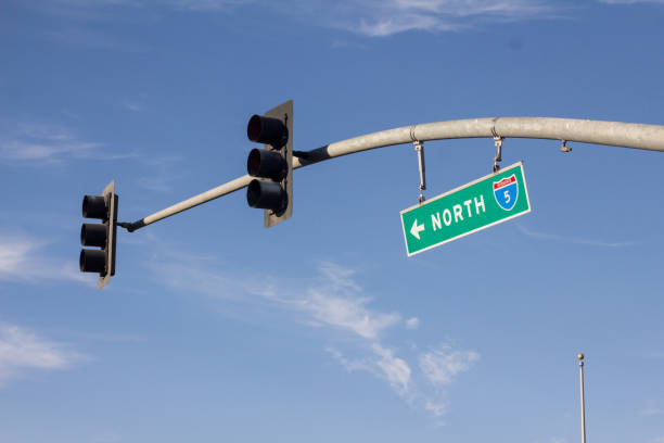istock A highway sign next to a traffic light on an American highway 1226619309