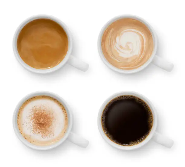 Collection of four mugs with different coffee types isolated on white