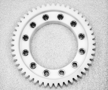 White gear plastic sprocket wheel parts product photography