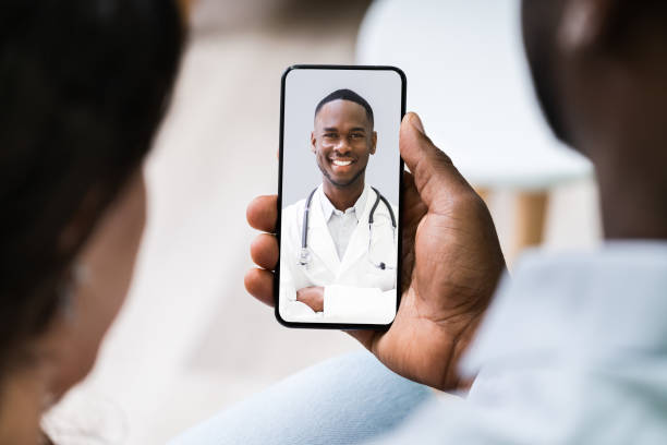 istock Couple Videoconferencing With Doctor On Mobile Phone 1226620522