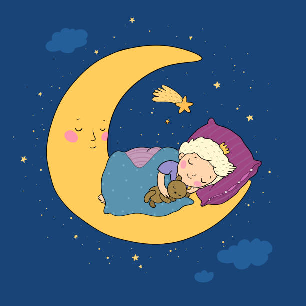 istock The little prince is sleeping on the moon. Cute cartoon boy in bed. 1226621664