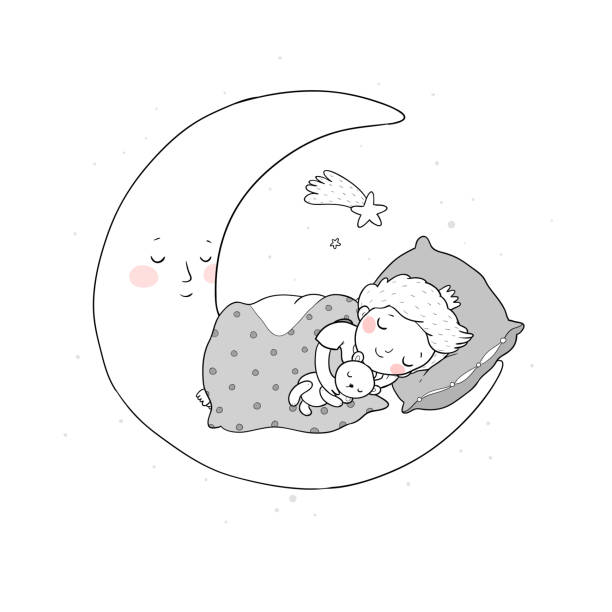 istock The little prince is sleeping on the moon. Cute cartoon boy in bed. 1226621772