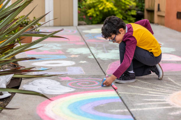 istock Stay at Home Chalk Drawing on Sidewalk 1226623665