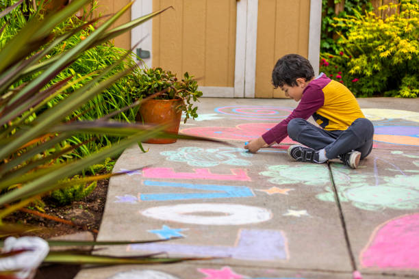 istock Stay at Home Chalk Drawing on Sidewalk 1226623666