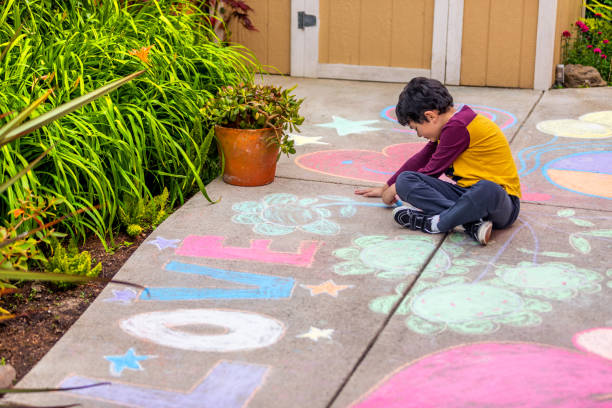 istock Stay at Home Chalk Drawing on Sidewalk 1226623675