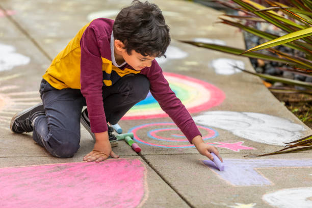 istock Stay at Home Chalk Drawing on Sidewalk 1226623679