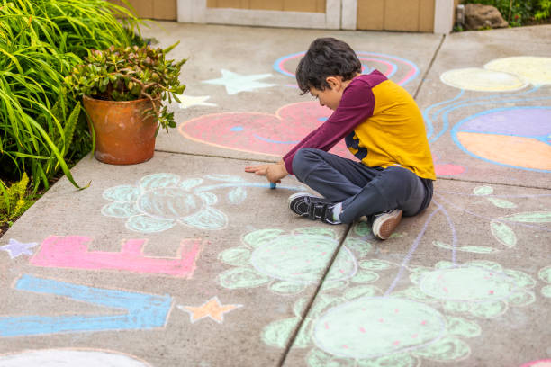 istock Stay at Home Chalk Drawing on Sidewalk 1226623682