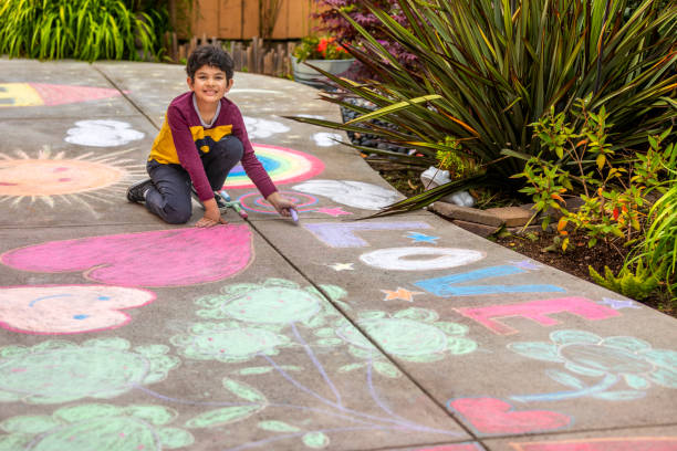 istock Stay at Home Chalk Drawing on Sidewalk 1226623683
