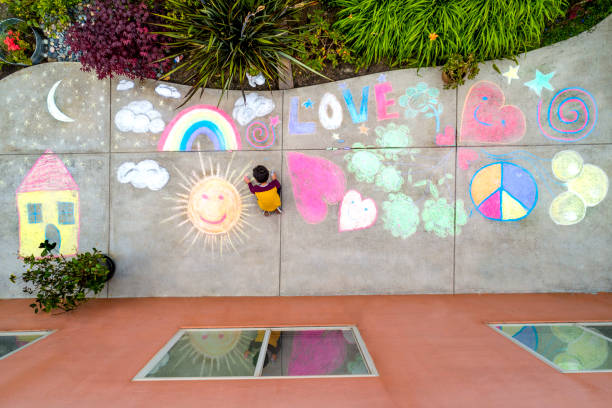 istock Stay at Home Chalk Drawing on Sidewalk 1226623688