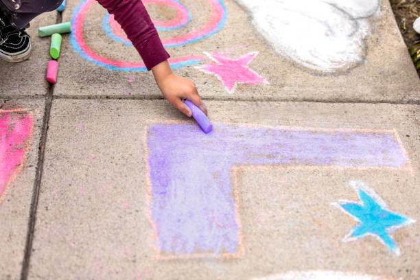 istock Stay at Home Chalk Drawing on Sidewalk 1226623692