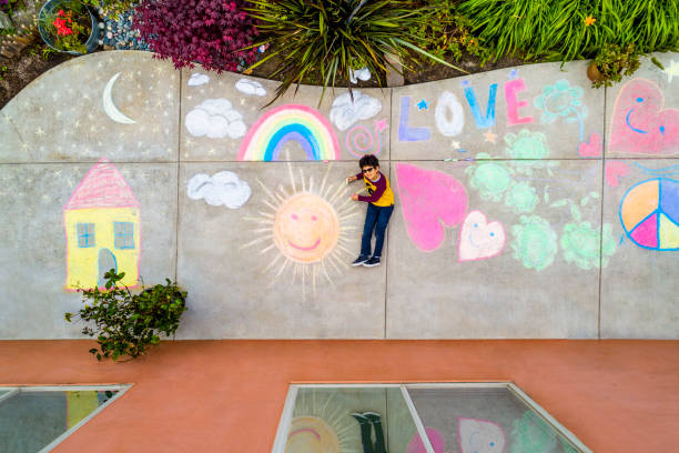 istock Stay at Home Chalk Drawing on Sidewalk 1226623693