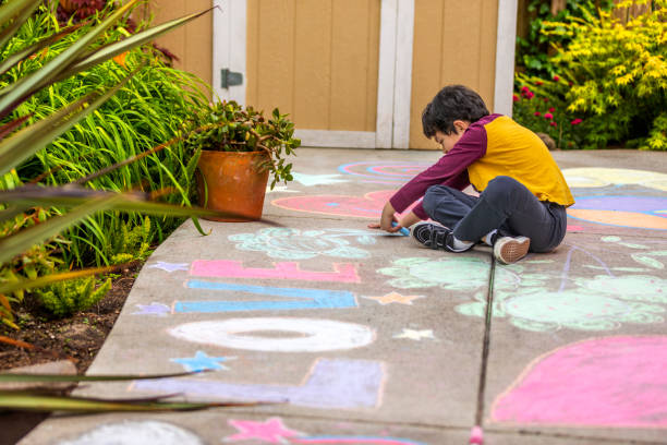 istock Stay at Home Chalk Drawing on Sidewalk 1226623701