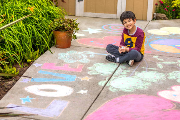 istock Stay at Home Chalk Drawing on Sidewalk 1226623703