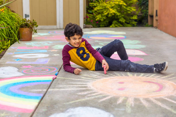 istock Stay at Home Chalk Drawing on Sidewalk 1226623711