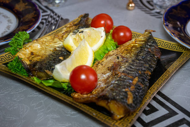 istock Baked mackerel with tomatoes and lemon 1226623765
