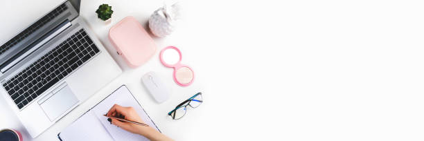 istock Top view office cozy female work place with copy space. Flat lay panoramic banner on wite background. 1226623818