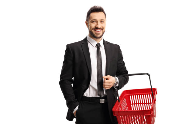 istock Businessman in a suit with a shopping basket 1226629918