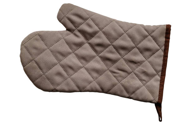 istock Brown kitchen quilted glove on a white background. 1226633037