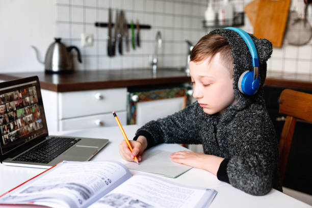 istock Kid boy studying from home. Homeschooling. 1226635598
