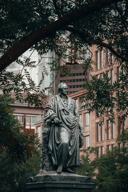 The statue of Goethe standing at the Goetheplatz in downtown Frankfurt
