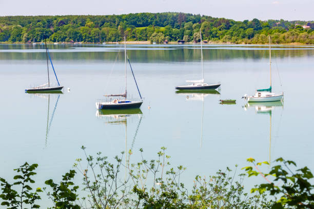 istock Landscape with four anchoring sailboats (Stegen, Bavaria / Germany). 1226636687