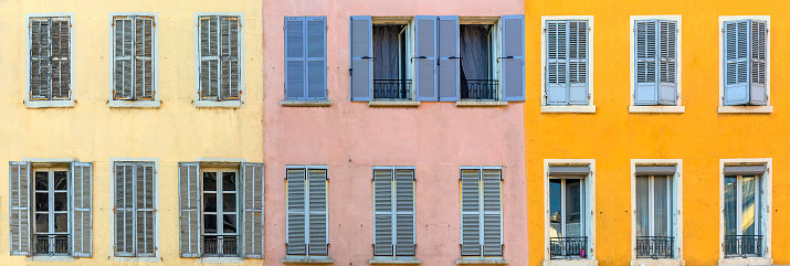 Panorama shot of old building facades with windows in Marseille, France
