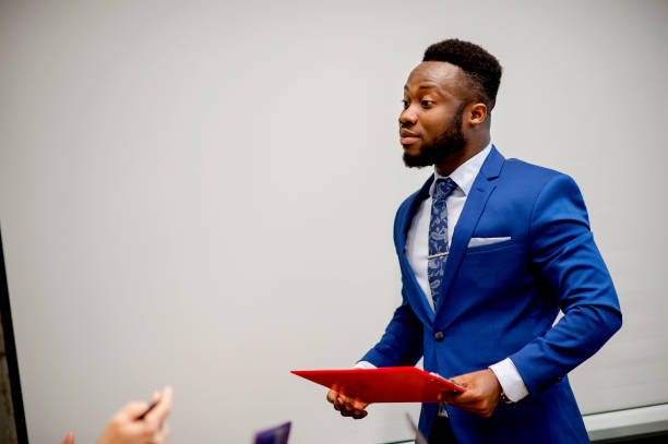 istock Young businessman sharing ideas in office 1226637918