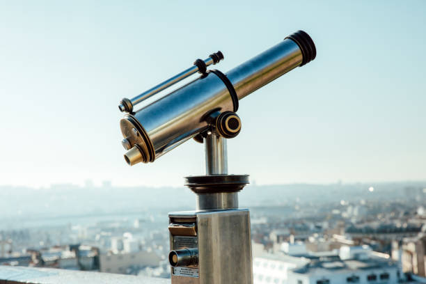 istock Telescope looking over Paris cityscape 1226639981