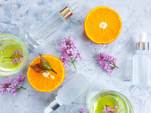 istock cosmetic serum, orange on a concrete background 1226641278