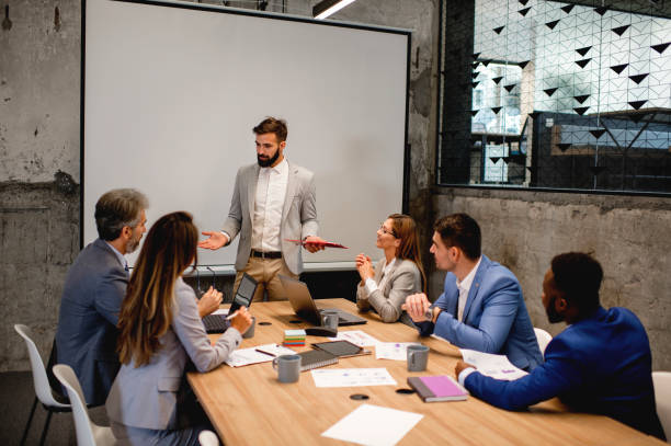 istock Business people discussing in board room 1226643611