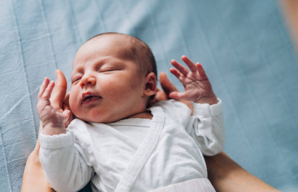istock Newborn Baby in Mother's Hands 1226644952