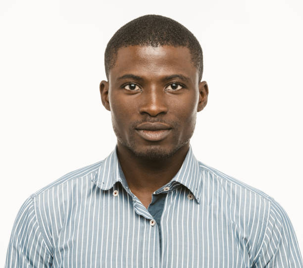 istock Attractive Dark-skinned guy looks confident. African american serious man isolated on white background. Toned image 1226647790