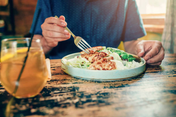 istock Young man enjoying a healthy meal. 1226652053