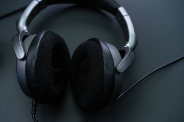 istock Cassette player with headphones on a black background 1226655640