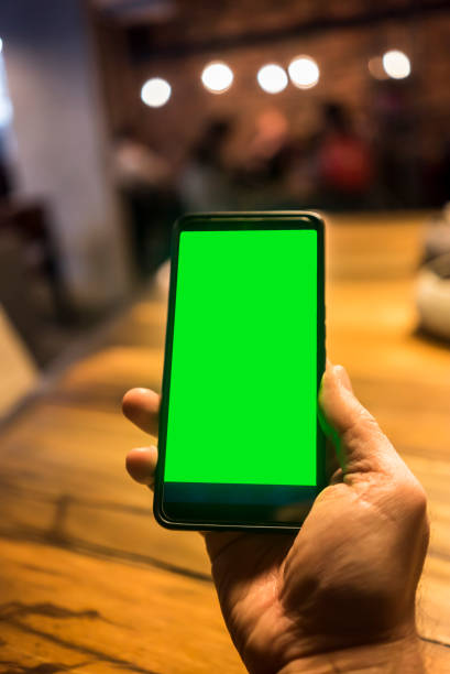 istock Green Screened Mobile Phone In Hand 1226656893