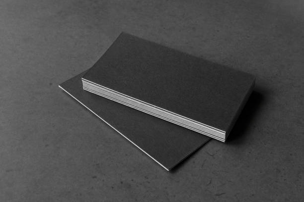 istock Business card on black background. 1226657684