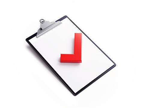 Black clipboard with to red check mark isolated on white background. Horizontal composition with clipping path and copy space. High angle view.