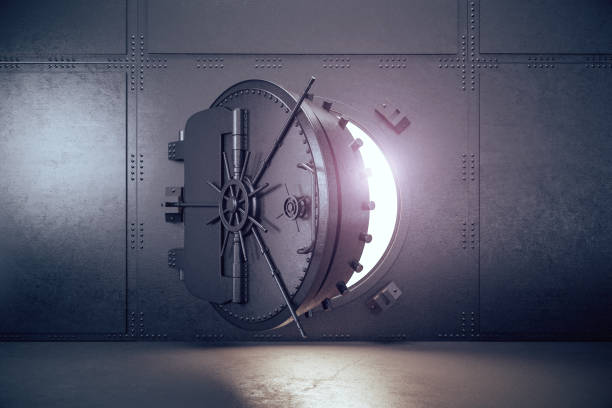 istock Closed gray safe metal door. 1226659483