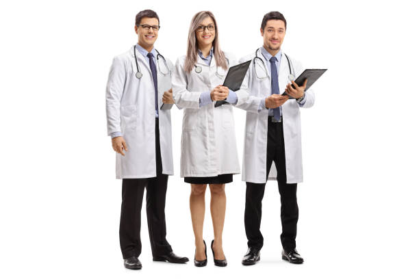 istock Team of young doctors posing and smiling at the camera 1226660546