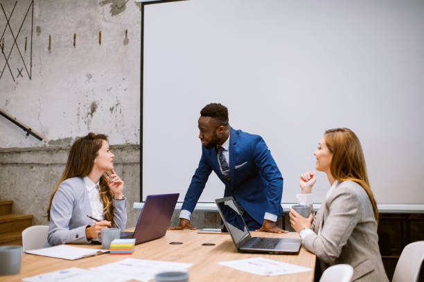 istock Young businessman sharing ideas in office 1226660551
