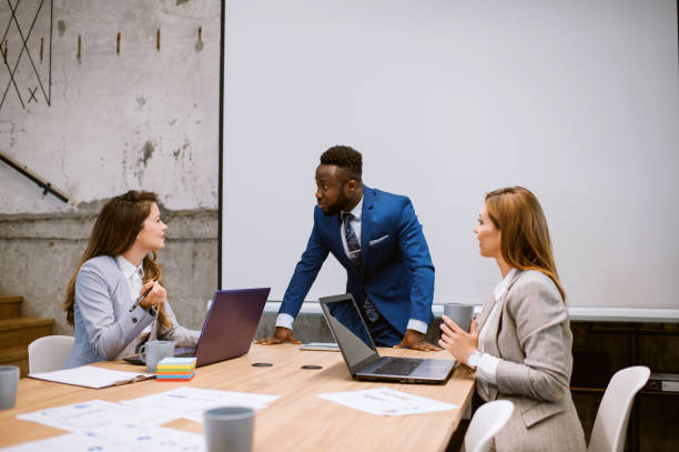 istock Young businessman sharing ideas in office 1226660764