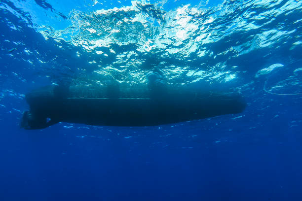 istock View up of boat floating on water surface 1226665460