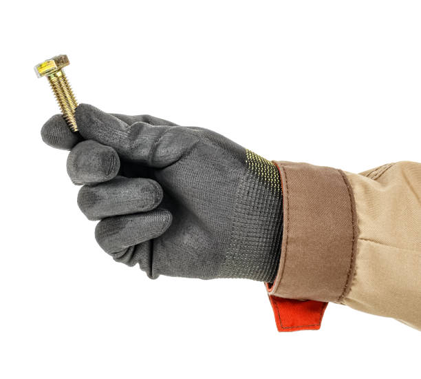 istock Lage bolt in worker hand in black protective glove and brown uniform isolated on white background 1226670957