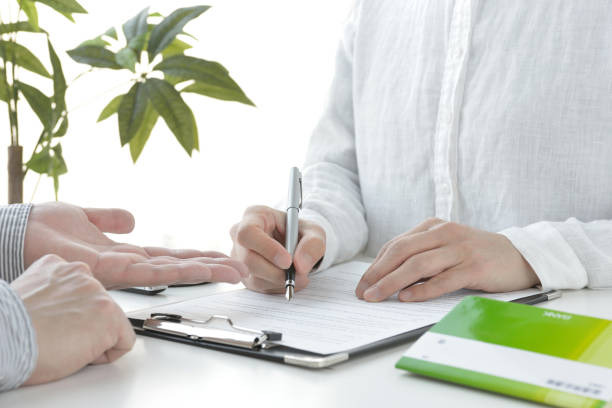 Japanese woman signing contract