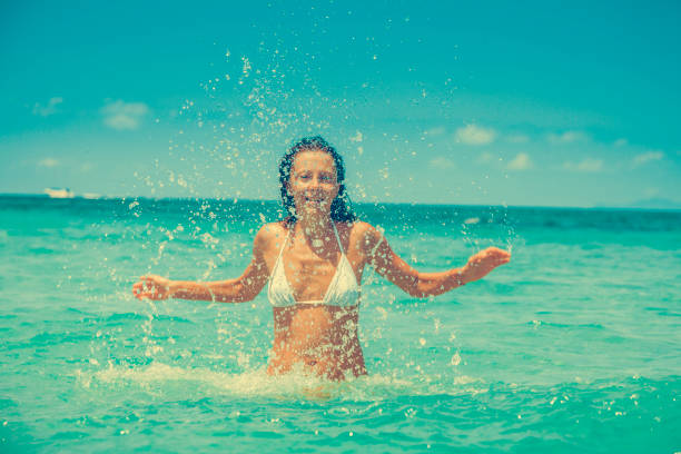 istock Woman at tropical beach 1226673471