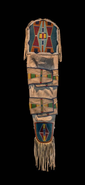 Native American papoose cradleboard isolated on black background. Clipping path.