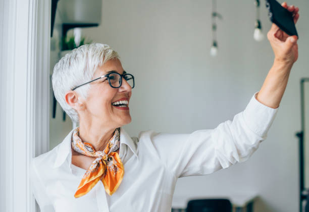 istock Mature businesswoman make video call. 1226681933
